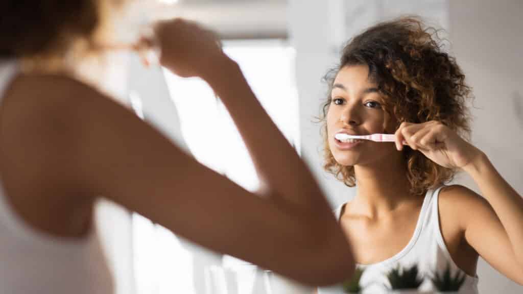 african american girl brushing teeth with toothbru 2022 12 16 09 22 55 utc