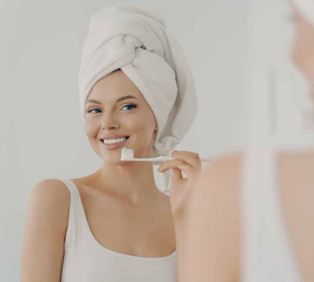 beautiful young woman with healthy perfect smile b 2022 02 22 15 39 28 utc scaled e1698684643338