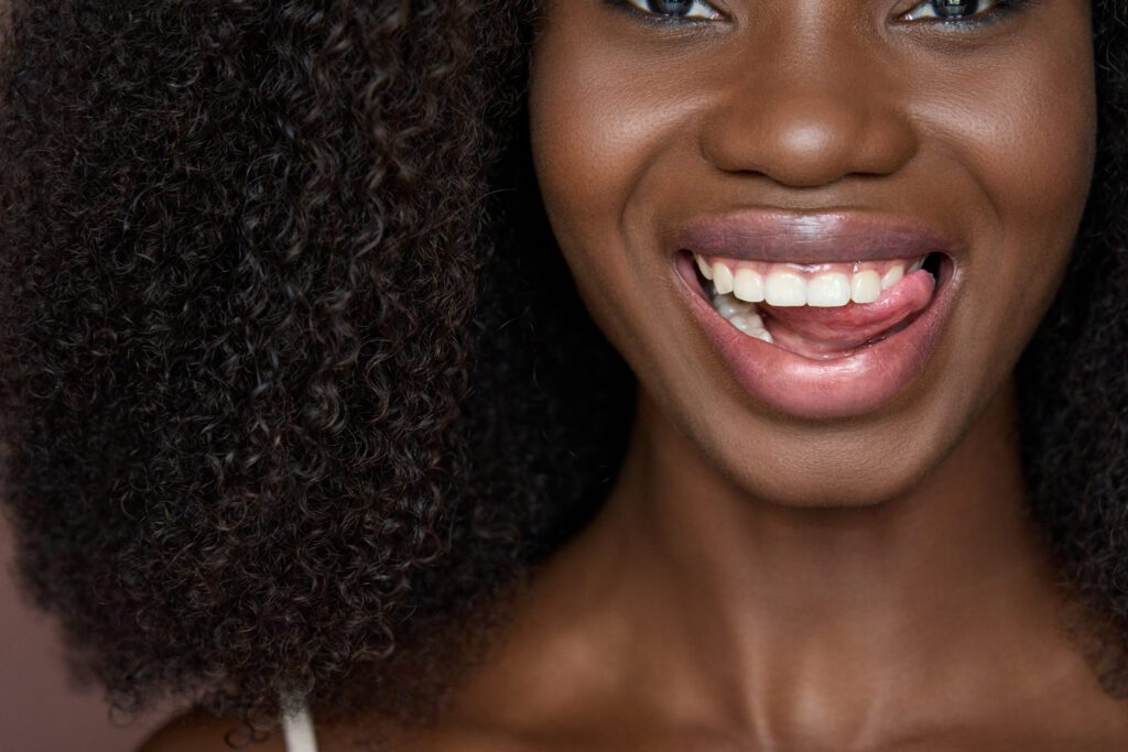 happy black young woman smiling with dental smile 2021 10 19 16 09 26 utc