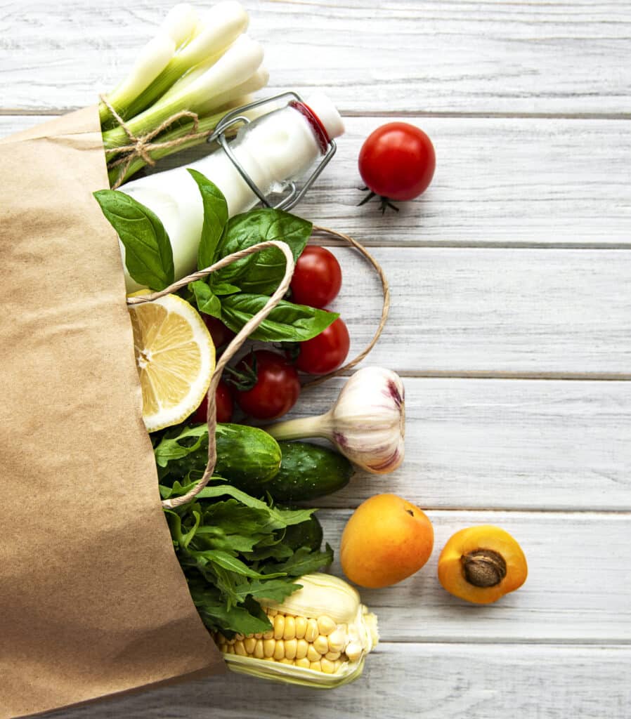 healthy food background healthy food in paper ba 2021 12 09 02 46 38 utc scaled e1698652394898