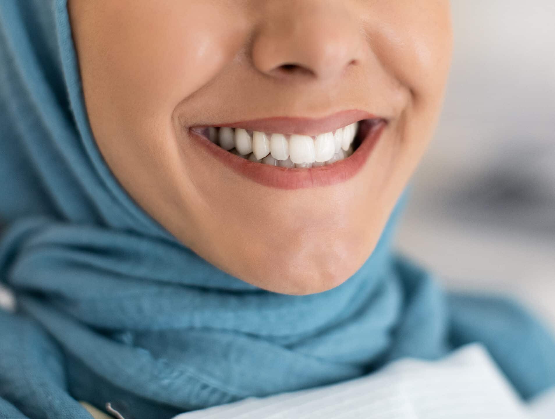 perfect smile concept closeup shot of islamic lad 2022 12 16 08 41 03 utc scaled e1698694528430